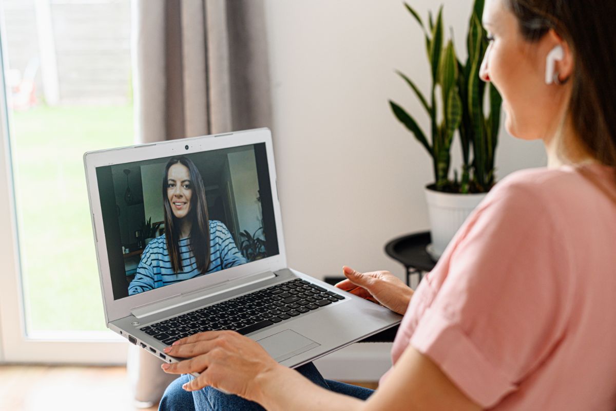woman in a virtual meeting with a co worker