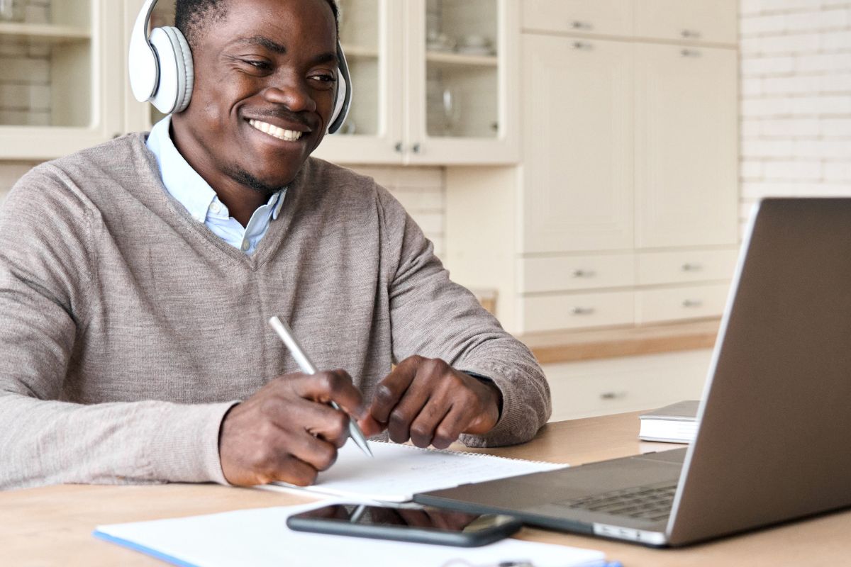 male client on a video call on his laptop