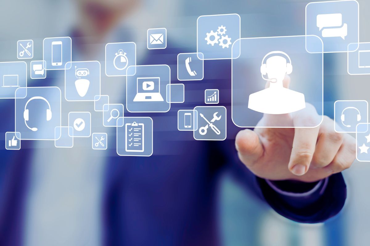 man pointing to a user in a 3D selection of icons