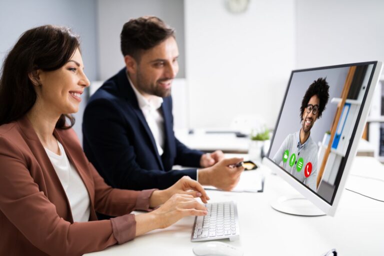 male and female client speaking with VA through video call