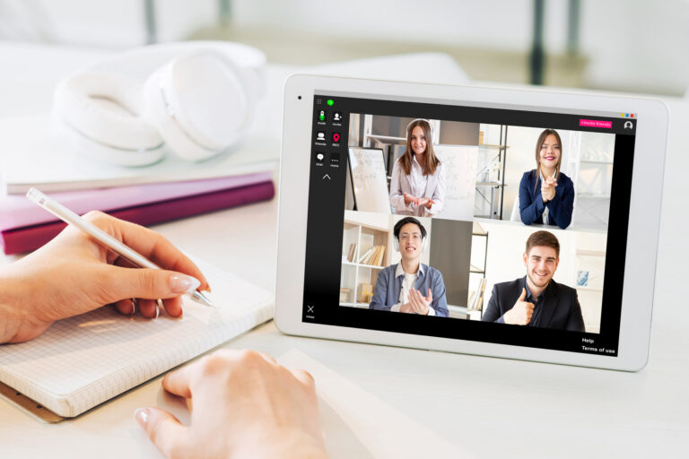 person attending a virtual meeting