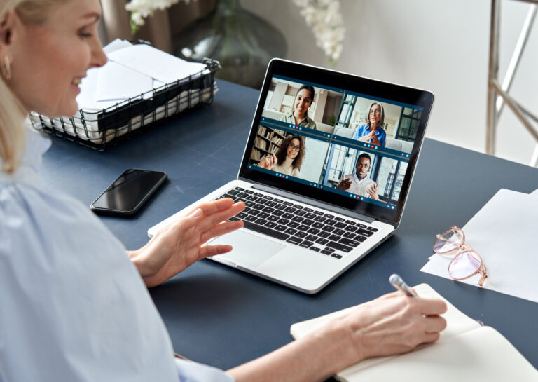 Woman on a zoom call with her team