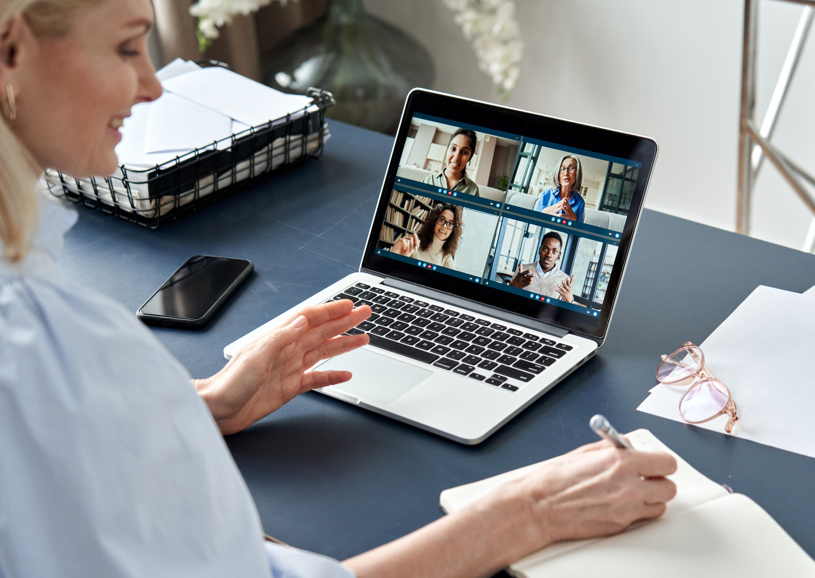 Woman on a zoom call with her team