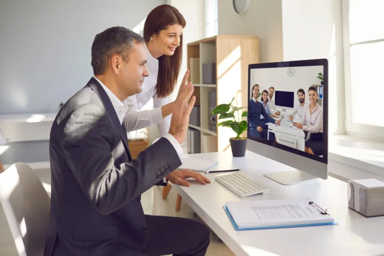 male and female client having a meeting with the team virtually