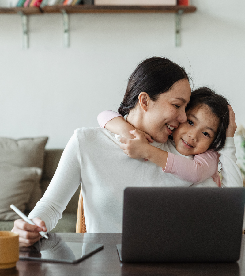 Mother and daughter hugging