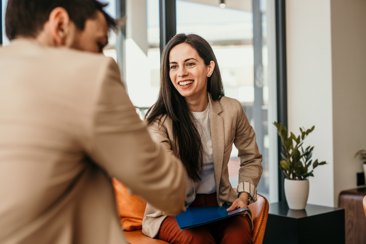 Female interviewee getting hired by the male interviewer